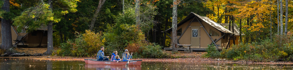 A family doing canoe during fall